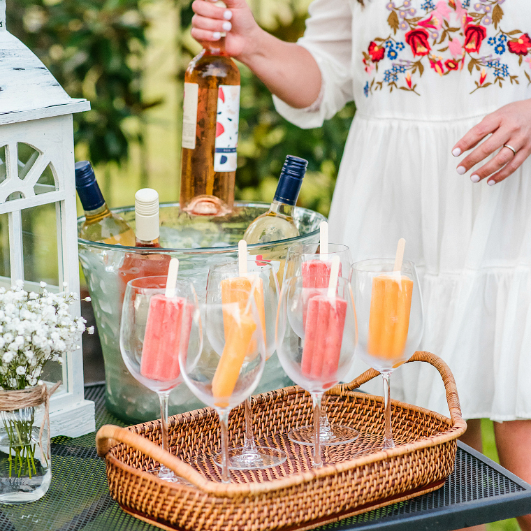 Easy and Refreshing Way to Serve Wine at a Barbecue Wine Bottle in ice Popsicles in Glass