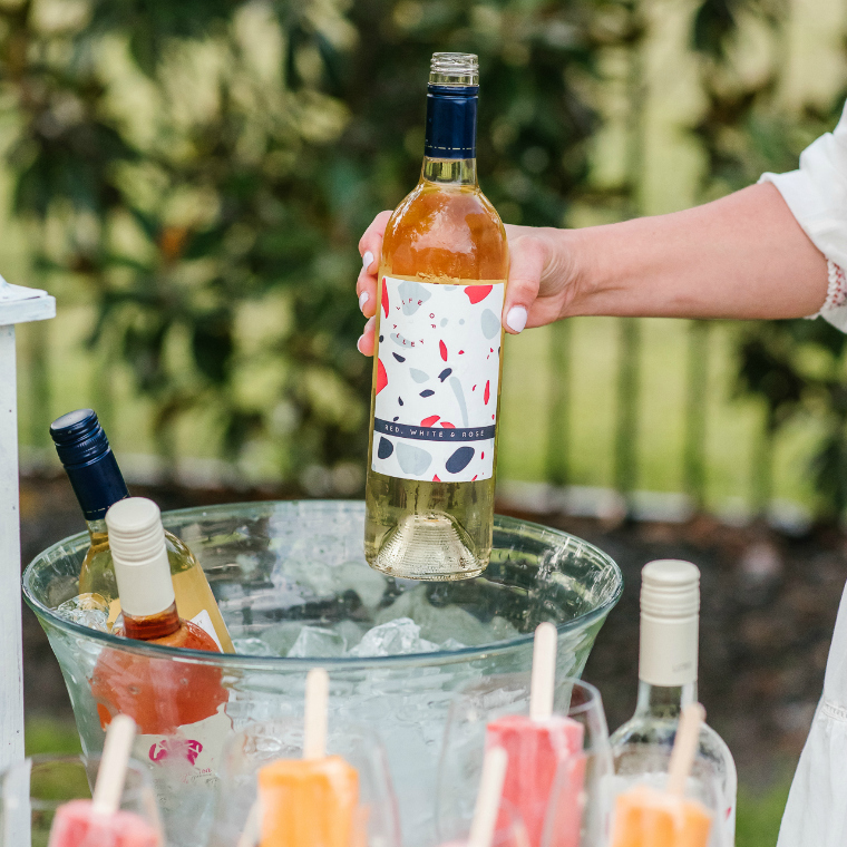 _Easy and Refreshing Way to Serve Wine at a Barbecue wine bottle in ice