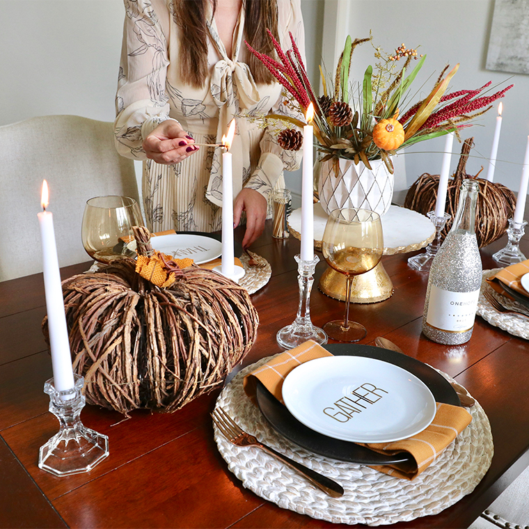 Tips To Create A Classic Autumn Tablescape- lighting a candle